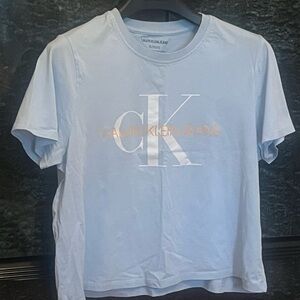 Calvin Klein Pale Blue Cropped Tee with White CK Logo